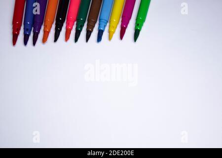 multicolored felt-tip pens on a white background. stationery concept. copy space. isolated. High quality photo Stock Photo