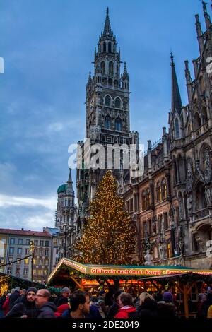 The Neues Rathaus (New Town Hall), towers over the Christmas market in the Marienplatz, Munich, Bavaria, Germany, with copy space Stock Photo