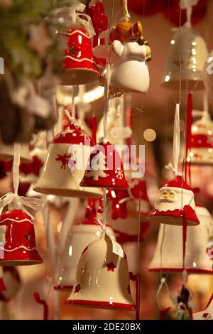 Christmas decorations hanging on a stall in a Christmas market in Munich, Germany Stock Photo