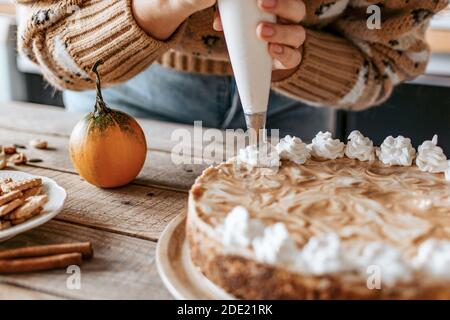 A shot of the cake decorating process Stock Photo