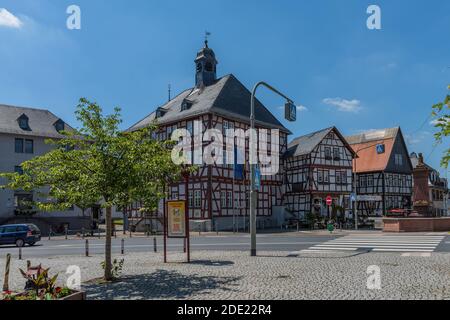 historic half-timbered town hall of the small town of Usingen, Hesse, Germany Stock Photo