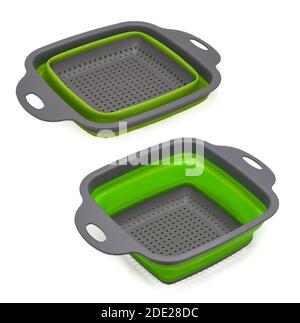Colander, plastic kitchen utensils on white background. Stock Photo