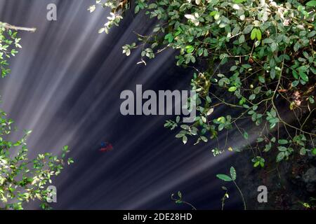 Jomblang Cave is one of the deepest vertical caves in Indonesia. Stock Photo