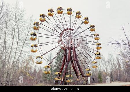 Abandoned ferris wheel in amusement park in Pripyat, Chernobyl area Stock Photo