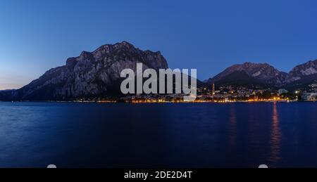 Night view from the lakefront promenade in Lecco on Lake Como, Northern Italy Stock Photo