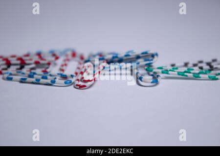 multicoloured paper clips. stationery concept. copy space. isolated. High quality photo Stock Photo