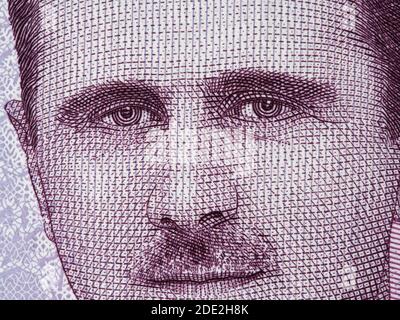 Bashar Assad portrait on Syria 2000 pounds banknote closeup macro, Syrian money close up Stock Photo