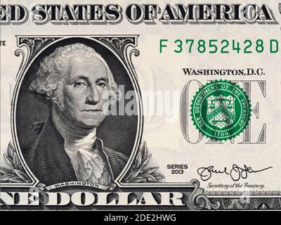 US president George Washington on USA one dollar bill close up, USA federal fed reserve note. American dollar is the official currency of the United S Stock Photo