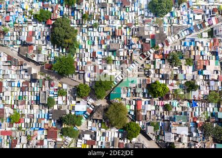 The northern cemetery in Manila with many graves and crypts in the city center aerial view. Travel concept. Stock Photo