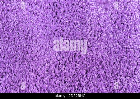 color purple fuchsia texture fluffy carpet synthetic material background Stock Photo