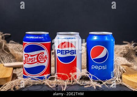Tyumen, Russia-November 01, 2020: Cans of Pepsi in a retro rustic style. owned by the American company PepsiCo. Stock Photo