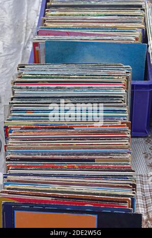 Stacked second hand vinyl records at flea market Stock Photo