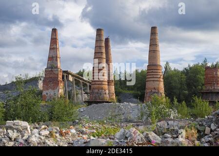 View of the ruins of the furnaces of the marble and lime factory on an August afternoon. Ruskeala, Karelia Stock Photo