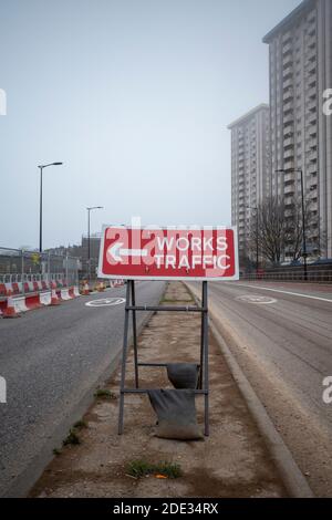 Works Traffic road signs outside the HS2 construction work on Hampstead Road in Camden Town, London, England Stock Photo