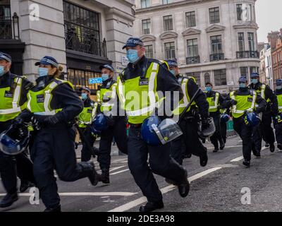 Police on duty during an anti lockdown protest in central London on the 28th November during the second national lockdown of 2020 in the UK.