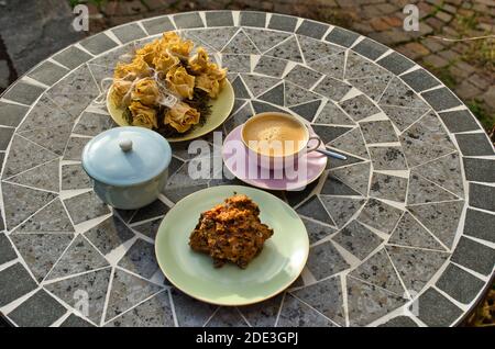 Coffee and cake time in the garden Stock Photo