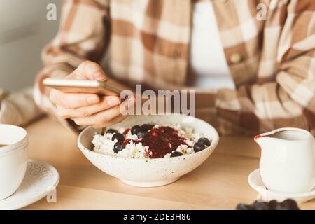 Concept for digital addiction. Woman is looking for information on Internet Stock Photo