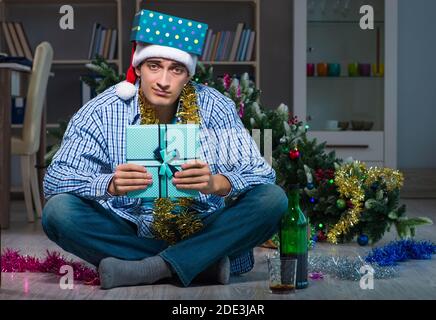 The man celebrating christmas at home alone Stock Photo
