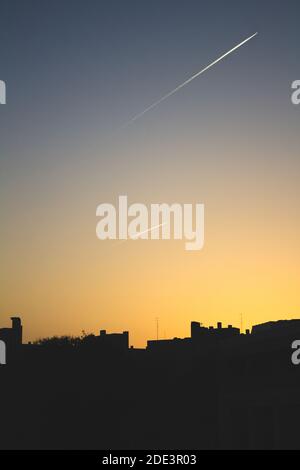 planes in the sky with skyline in madrid Stock Photo