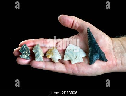 A handfull of real Texas arrowheads made around 7000 years ago. Stock Photo