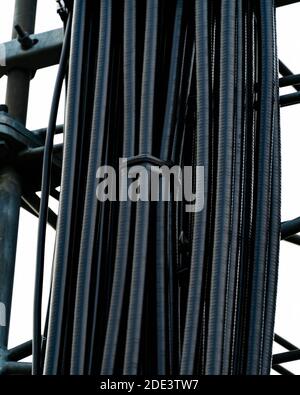 Thick black communications and power cables running in a cable cart. . High quality photo Stock Photo