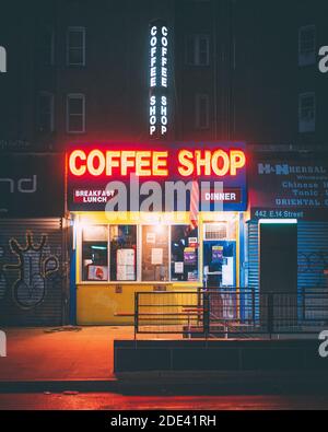 Coffee shop neon sign at night, on 14th Street in the East Village, Manhattan, New York City Stock Photo
