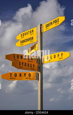 International sign post, Cape Reinga Lighthouse, Cape Reinga, Northland Region, North Island, New Zealand Stock Photo