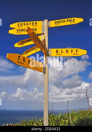 International sign post, Cape Reinga Lighthouse, Cape Reinga, Northland Region, North Island, New Zealand Stock Photo