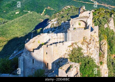 Aerial View of the Cathar castle of Peyrepertuse in Languedoc-Roussillon, France, Europe. Ancient Cathar site of the Château de Peyrepertuse, Peyreper Stock Photo