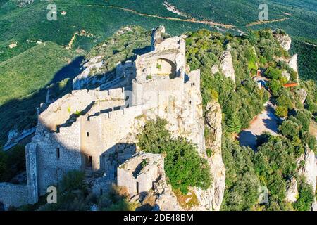 Aerial View of the Cathar castle of Peyrepertuse in Languedoc-Roussillon, France, Europe. Ancient Cathar site of the Château de Peyrepertuse, Peyreper Stock Photo