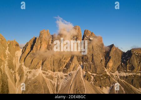 Aerial view, sunset at the Furchetta mountain with clouds, Geisler Alm, Sankt Magdalena, South Tyrol, Italy Stock Photo
