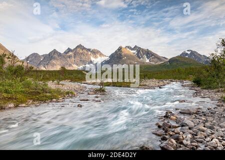 River off Bergen in the Lyngen Alps, near Blue Lake or Blaisvatnet, Lyngenfjord, Troms og Finnmark, Norway Stock Photo