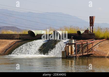 Level Controlled Reservoir Dam With Inlet Pipes Stock Photo