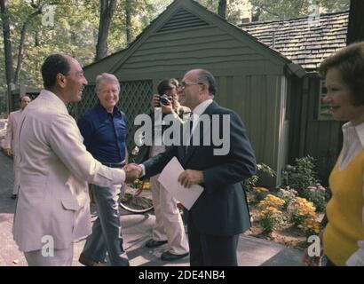 Jimmy Carter and Rosalynn Carter â€“ With President Anwar Sadat and Prime Minister Menahem Begin Greeting Each Other at the Camp David Summit ca.  7 September 1978 Stock Photo