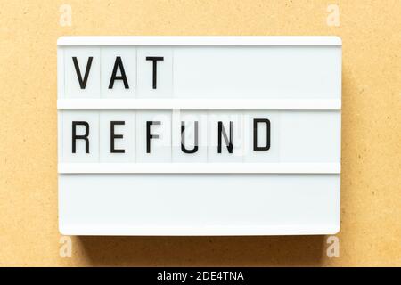 Lightbox with word vat refund on wood background Stock Photo