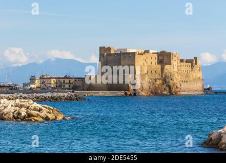 built during the 15th century, and a main landmark in Naples, Castel dell'Ovo (Egg Castle) is a seaside castle located in the Gulf of Naples Stock Photo