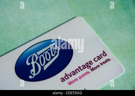 Durham, UK - 7 May 20: Boots advantage card on pattern background. Customers collect points on purchases to spend in store. Loyalty card. UK retailer Stock Photo