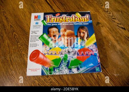 Durham, UK - 5 April 2020: Frustration (also known as Trouble and  Kimble) is a family fun board game  in which players compete to be the first to sen Stock Photo