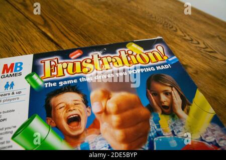 Durham, UK - 5 April 2020: Frustration (also known as Trouble and  Kimble) is a family fun board game  in which players compete to be the first to sen Stock Photo