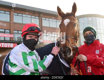 Zanahiyr with jockey Jack Kennedy and groom Darren Tracy after winning the Bar One Racing Price Boost Juvenile Hurdle at Fairyhouse Racecourse Stock Photo Alamy