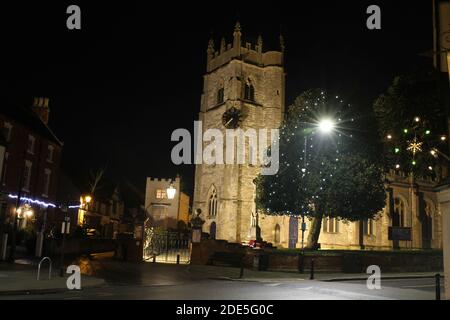 St Nicholas Church and Tower, in Shakespeare Country, Alcester, Warwickshire UK. At night with Christmas Lights. Stock Photo