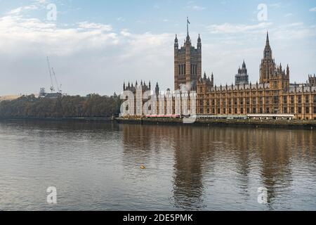 Houses of Parliament, the iconic London building and tourist attraction with bright blue sky, shot in Coronavirus Covid-19 lockdown in England, UK Stock Photo