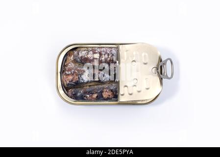 Closeup of an open can of sardines isolated on white background. Canned sardine. Stock Photo