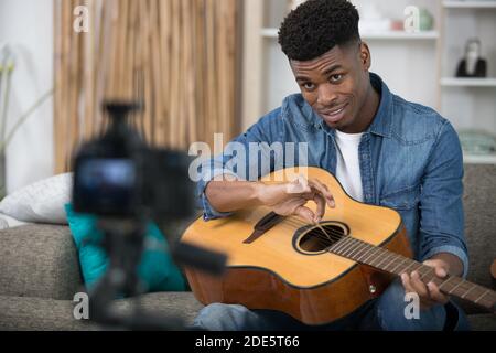 handsome man is recording song Stock Photo