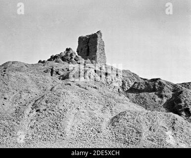 Original Caption:  Iraq. Birs Nimrud. (Possibly the Tower of Babel). So-called Tower of Babel. Distant view  - Location: Iraq--Borsippa ca.  1932 Stock Photo