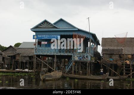 Politiacl party's constituency office based on a house on stilts in the floating village of Kampong Phluk. Stock Photo