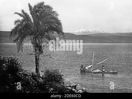 'Middle East History - Choice set of thirteen slides illustrating the Sea of Galilee and its fishermen still ''toiling with their nets.'' ''A fire of coals''' Stock Photo