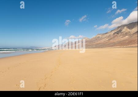 Footprints in sand on Cofete beach, Fuerteventura island, Canary islands, Spain Stock Photo