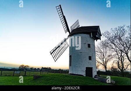 Ashton, Somerset, UK, 26 November 2020, 18th century tower mill on hillside Stock Photo