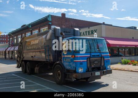 Trash truck on Main Street in downtown Fitchburg, Massachusetts MA, USA. Stock Photo
